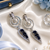 Rhodium finish sapphire halo drop earrings