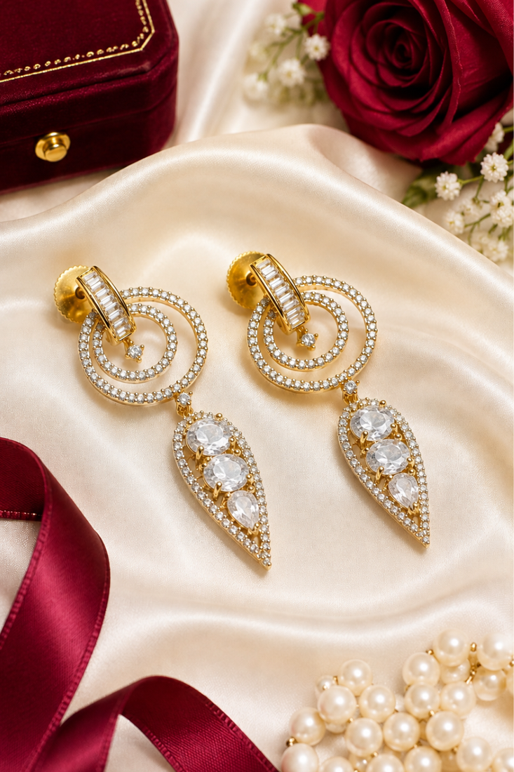 Gold finish white halo drop earrings