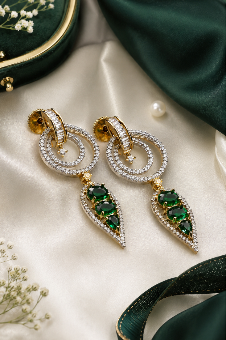 Gold finish emerald halo drop earrings