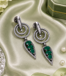 Black silver finish green halo drop earrings
