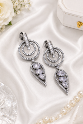 Black silver finish white halo drop earrings 1