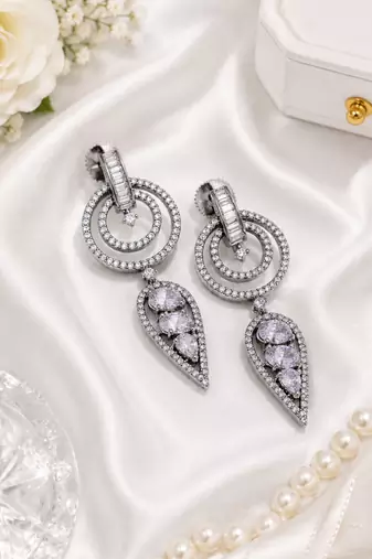 Black silver finish white halo drop earrings