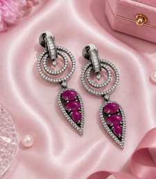 Black silver finish magenta halo drop earrings
