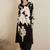 Women Floral Printed Regular Thread Work Kurta with Trousers