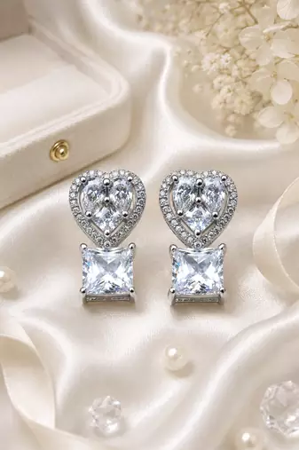 Rhodium finish heart halo crystal earrings
