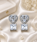 Rhodium finish heart halo crystal earrings
