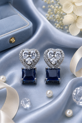 Rhodium finish heart halo sapphire earrings 1
