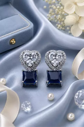 Rhodium finish heart halo sapphire earrings