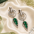 Black silver finish green halo drop earrings