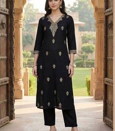 Women Ethnic Motifs Embroidered Thread Work Silk Kurta with Trousers
