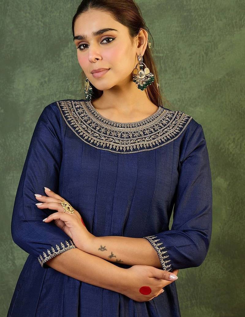 Women Ethnic Motifs Embroidered Panelled Thread Work Kurta with Trousers