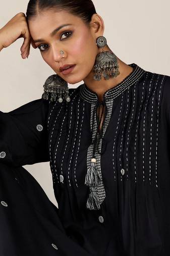 Women Ethnic Motifs Embroidered Panelled Thread Work Kurta with Trousers