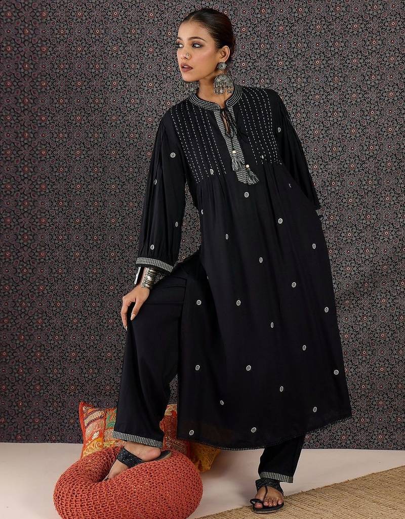 Women Ethnic Motifs Embroidered Panelled Thread Work Kurta with Trousers