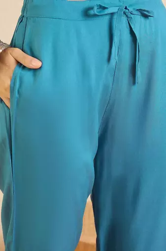 Women Ethnic Motifs Embroidered Regular Thread Work Kurta with Trousers