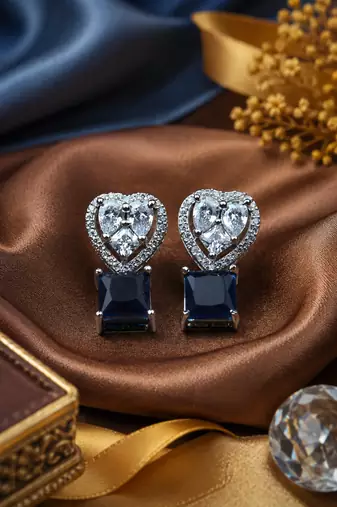 Rhodium finish heart halo sapphire earrings