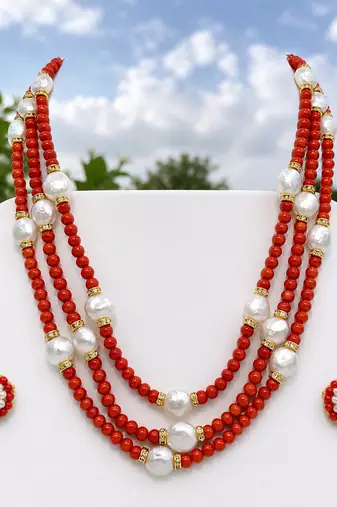 Gold-tone spacers, floral stud earrings, traditional indian wear, multi-strand design, red & white colour