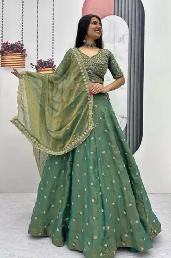 green silk blend embroidered traditional lehenga choli with free size upto 42