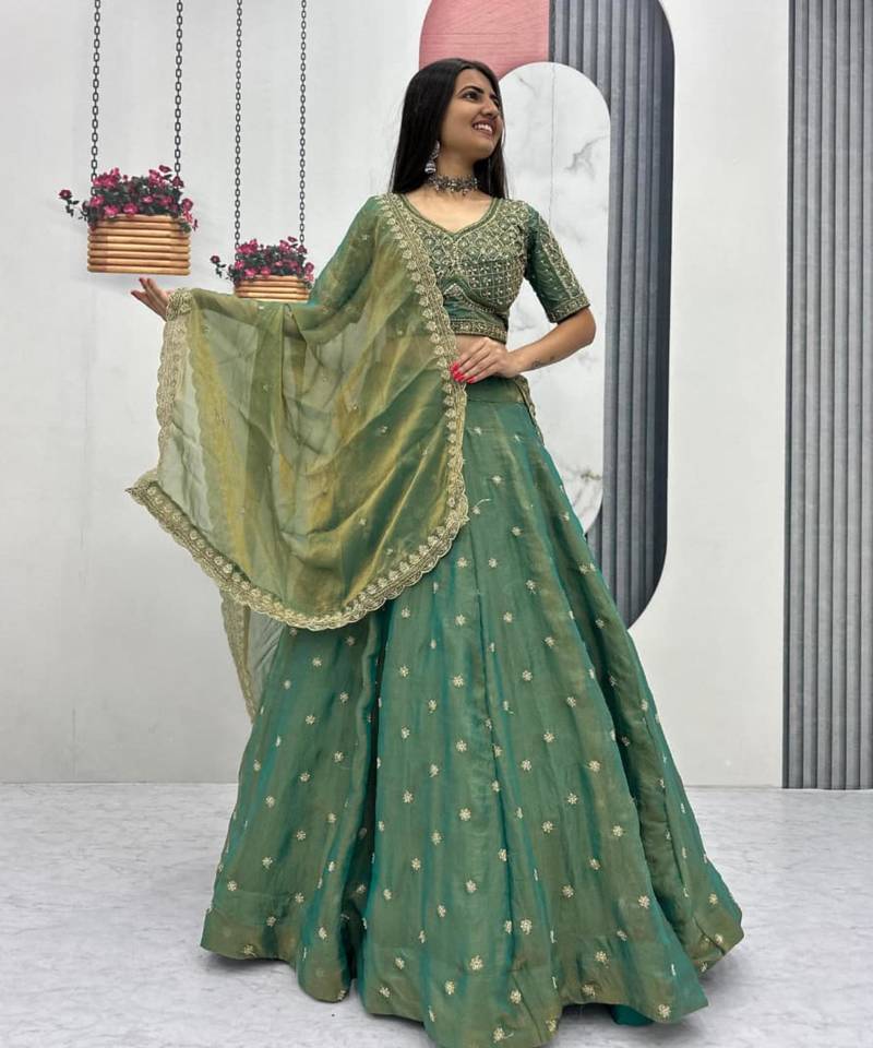 green silk blend embroidered traditional lehenga choli with free size upto 42