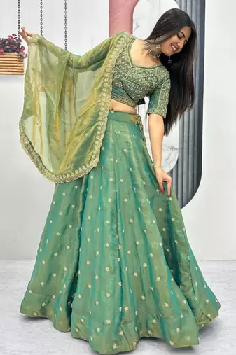 green silk blend embroidered traditional lehenga choli with free size upto 42