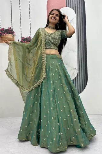 green silk blend embroidered traditional lehenga choli with free size upto 42