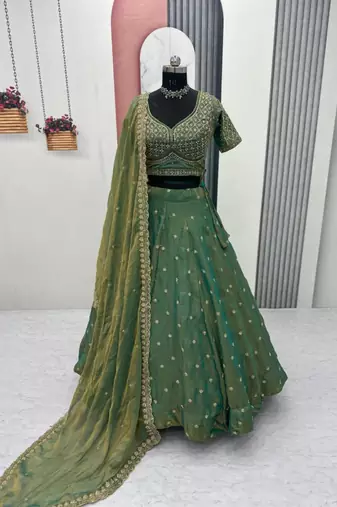 green silk blend embroidered traditional lehenga choli with free size upto 42