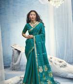 Turquoise pure munga silk blend handloom saree and contrast weaving border with organza pallu
