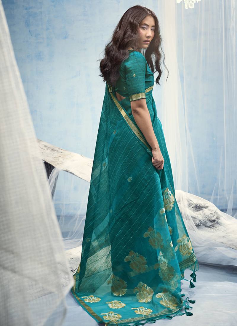 Turquoise pure munga silk blend handloom saree and contrast weaving border with organza pallu