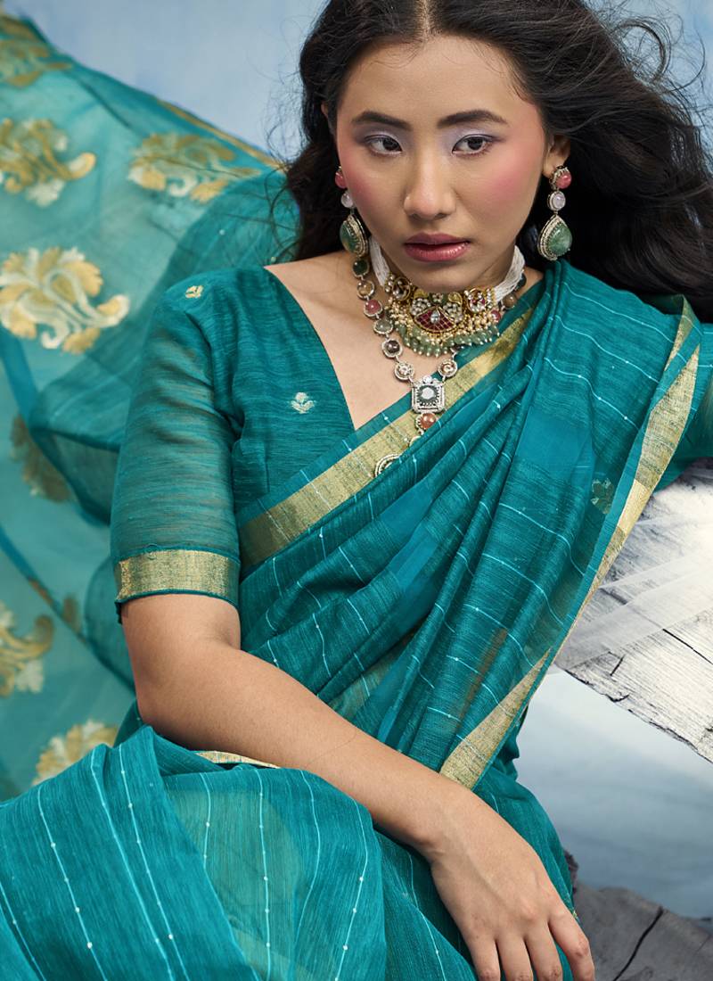 Turquoise pure munga silk blend handloom saree and contrast weaving border with organza pallu
