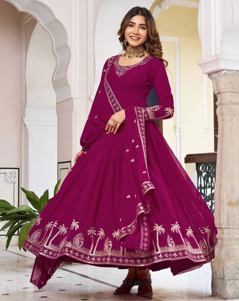 Magenta faux georgette embroidered flared gown set