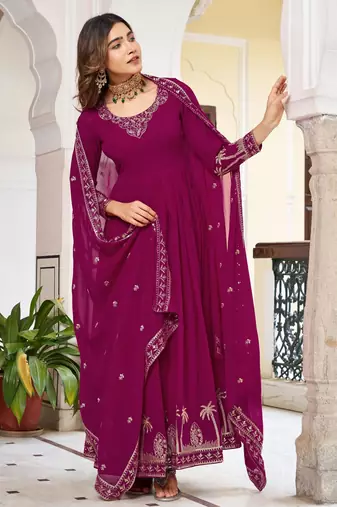 Magenta faux georgette embroidered flared gown set