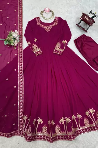Magenta faux georgette embroidered flared gown set