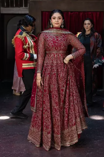 Red faux georgette embroidered flared gown set