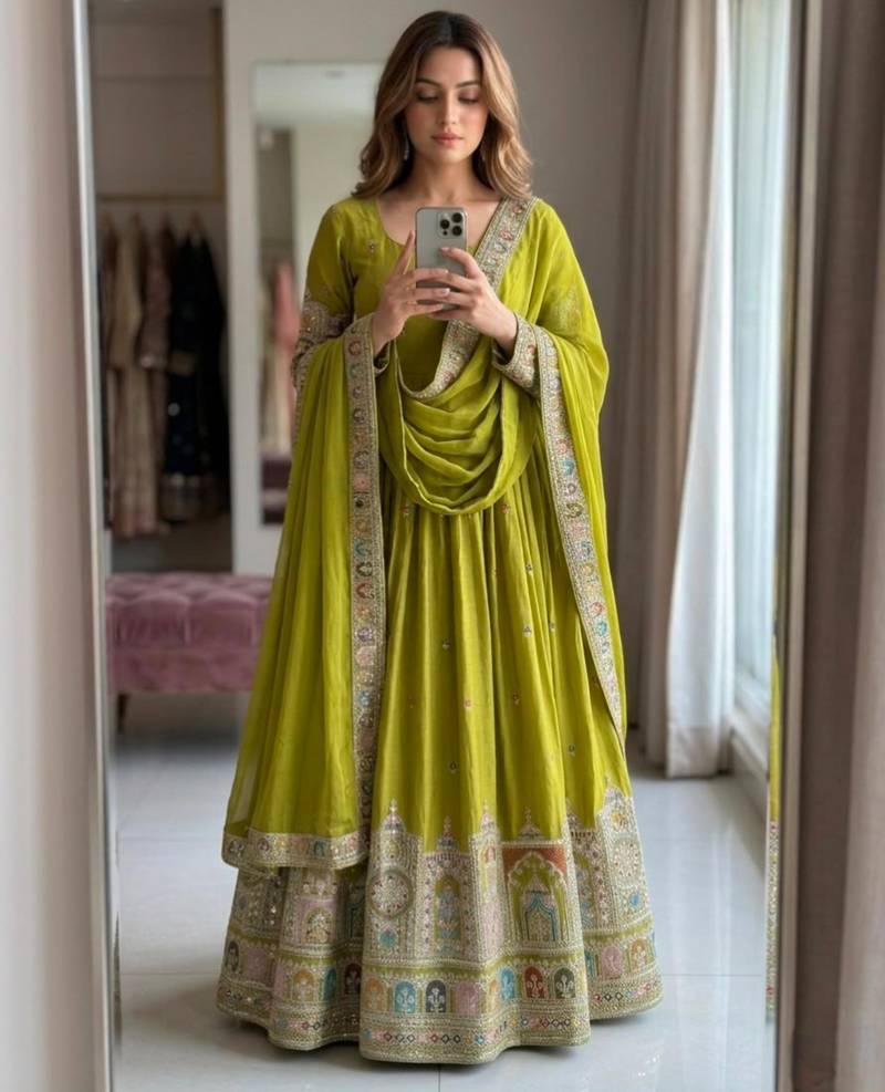 Green silk blend embroidered flared gown set