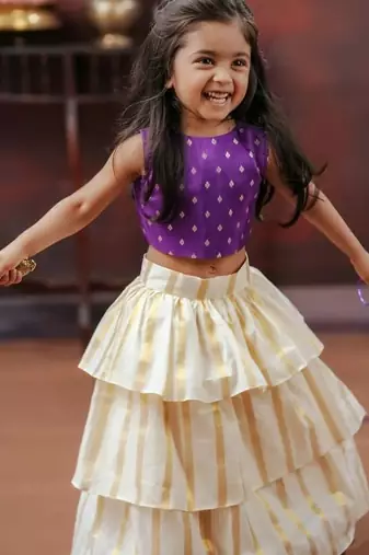 Violet and white kasavu wear skirt and top set