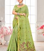 Sangam prints parrot green cotton blend woven work traditional saree