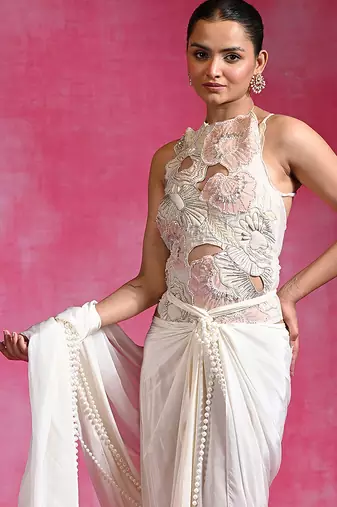 Ivory embroidered lycra net draped saree set