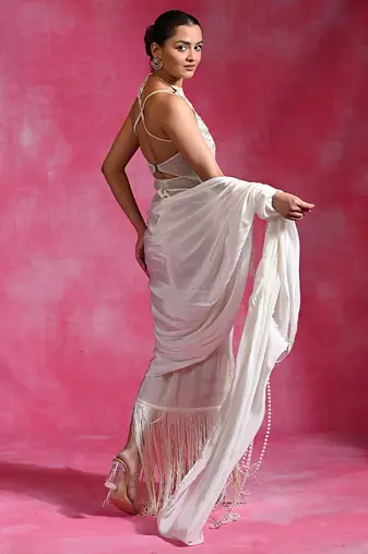Ivory embroidered lycra net draped saree set