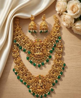 Temple jewelry set with goddess lakshmi pendant, peacock jhumkas & green beads - south indian bridal set 1