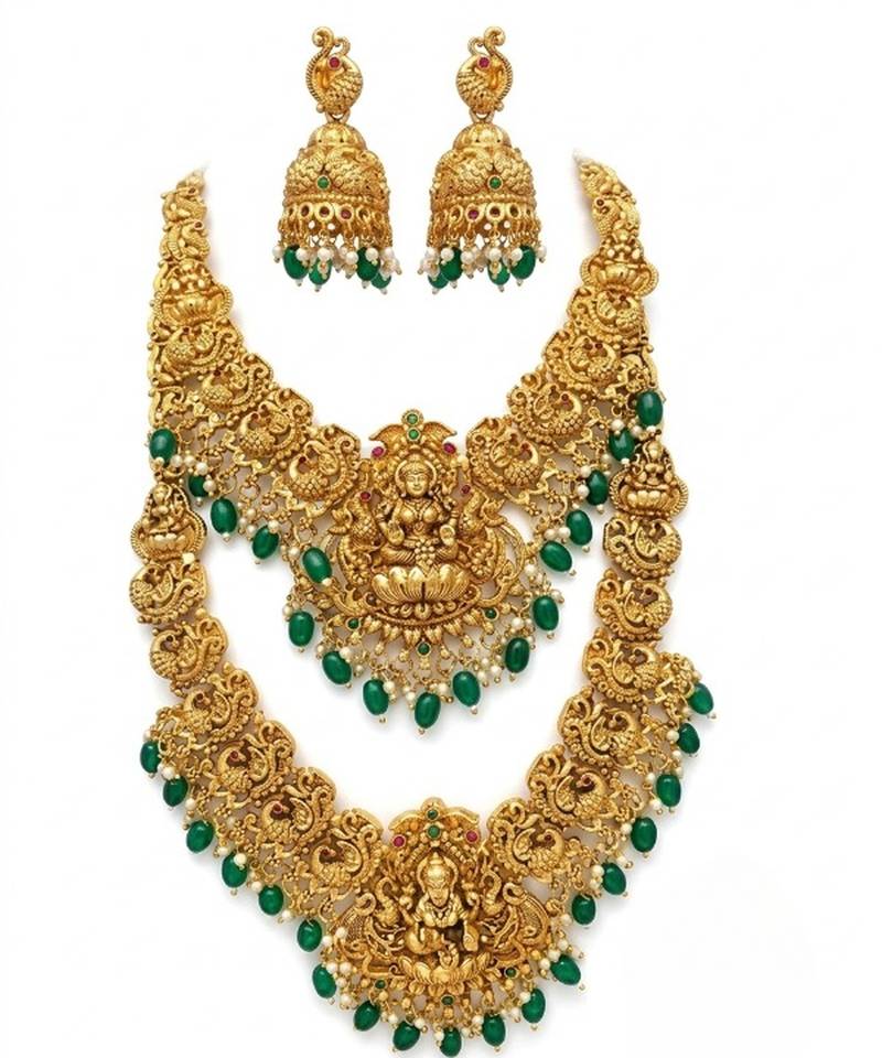 Temple jewelry set with goddess lakshmi pendant, peacock jhumkas & green beads - south indian bridal set