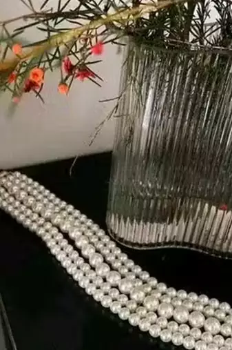 Multi-strand pearl choker necklace | elegant layered pearl statement jewelry