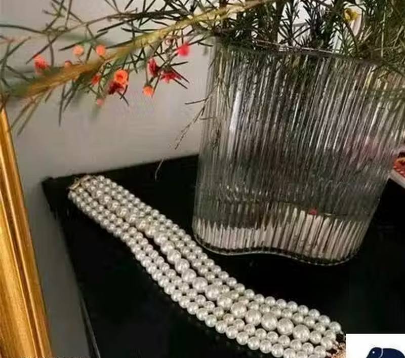 Multi-strand pearl choker necklace | elegant layered pearl statement jewelry