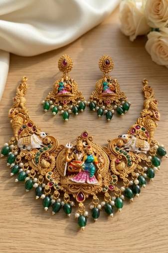 Antique gold south indian temple jewelry set: divine shiva parvati necklace with jhumkas for bridal & festive wear