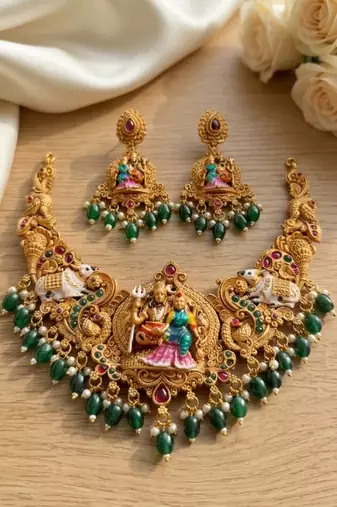 Antique gold south indian temple jewelry set: divine shiva parvati necklace with jhumkas for bridal & festive wear
