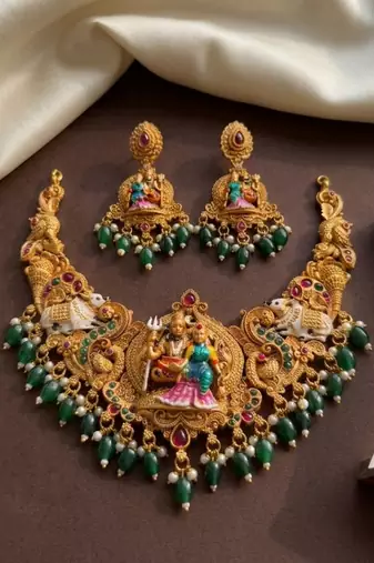 Antique gold south indian temple jewelry set: divine shiva parvati necklace with jhumkas for bridal & festive wear