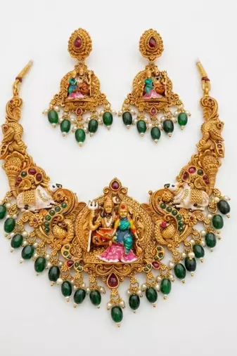 Antique gold south indian temple jewelry set: divine shiva parvati necklace with jhumkas for bridal & festive wear
