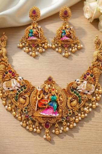 Antique gold south indian temple jewelry set: divine shiva parvati necklace with jhumkas for bridal & festive wear