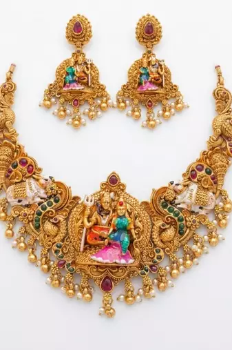 Antique gold south indian temple jewelry set: divine shiva parvati necklace with jhumkas for bridal & festive wear
