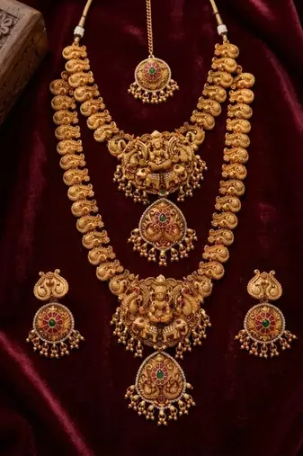 South indian temple jewelry set: lakshmi long haram necklace, choker, earrings & maang tikka bridal set
