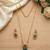 Temple jewelry set with emerald green stone pendant & drop earrings | indian bridal wedding necklace