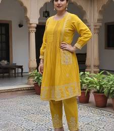Women Ethnic Motifs Embroidered Panelled Thread Work Cotton Kurta with Trousers